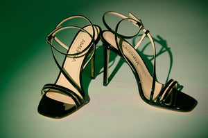 Black patent leather sandal made from sustainable material